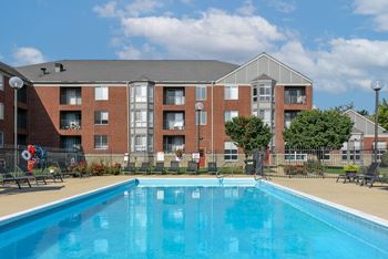 our apartments offer a swimming pool in front of our building at The Pointe at St. Joseph Apartments, South Bend, 46617